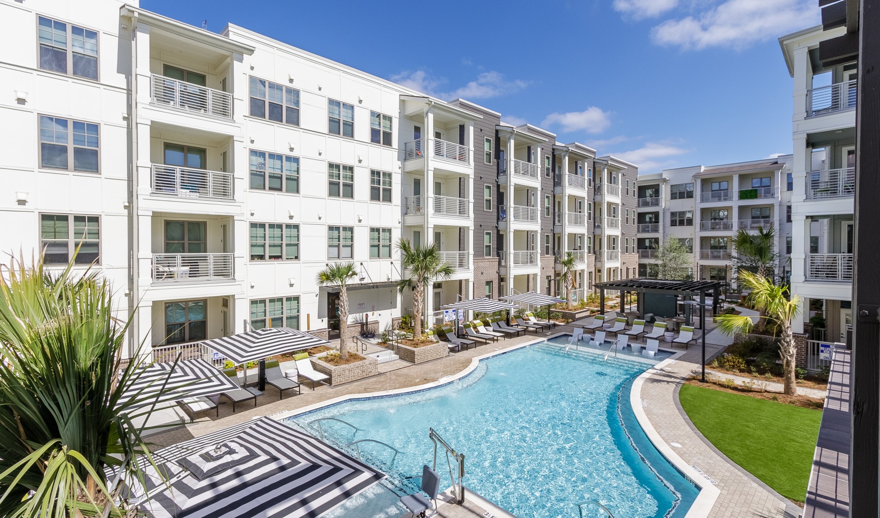 a pool with chairs around it
