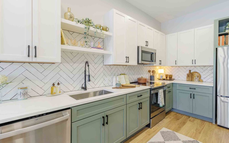  a kitchen with a table and chairs